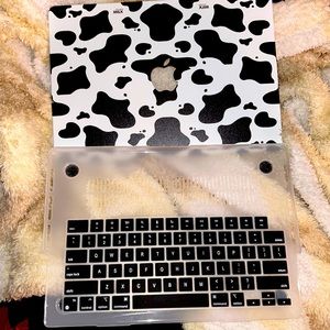 Cow print MacBook case. Brand new.